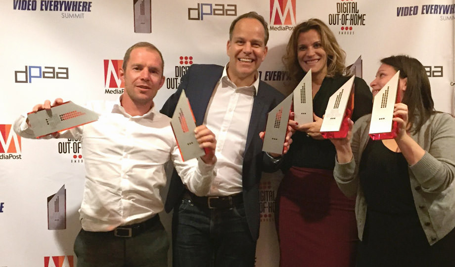 Founder Neil Morris and the GV New York team with their haul of six Mediapost DOOH Awards