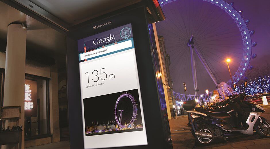 A digital screen featuring the programmatic creative DOOH campaign 'Google Outside'